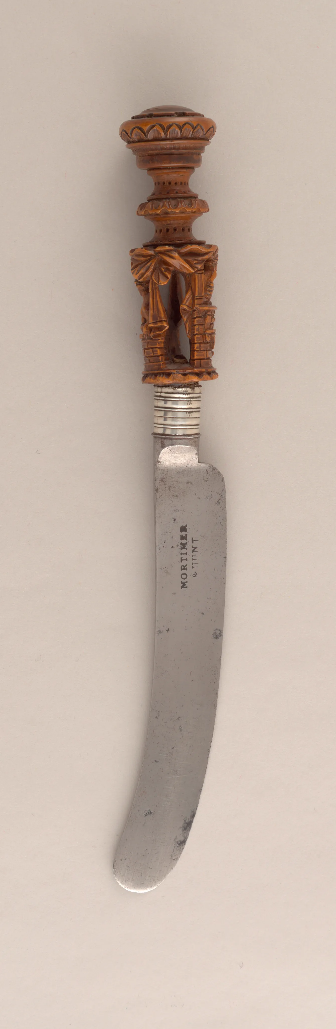 An antique English knife with an early-19th-century steel blade